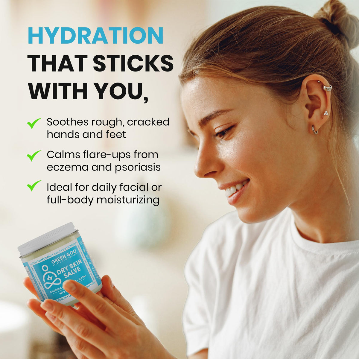 Green Goo Dry Skin Salve cream on hand highlights easy absorption and hydration.