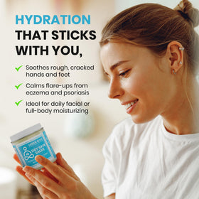 Green Goo Dry Skin Salve cream on hand highlights easy absorption and hydration.