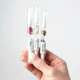 Greenmade Goods cuticle oil trio rose pen featuring real petals for renewed cuticles.