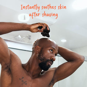 Groomie aftershave serum close-up bottle highlighting the simple, effective post-shave care routine.