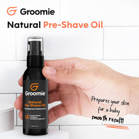 Groomie pre-shave oil with milk thistle highlighted for skin-friendly botanicals.