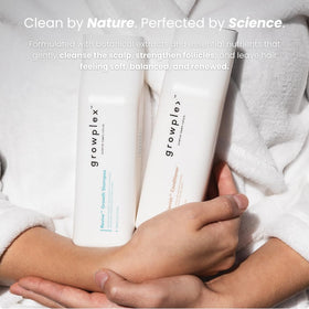 Growplex botanical ingredients scene highlighting caffeine, rosemary, and biotin blend.