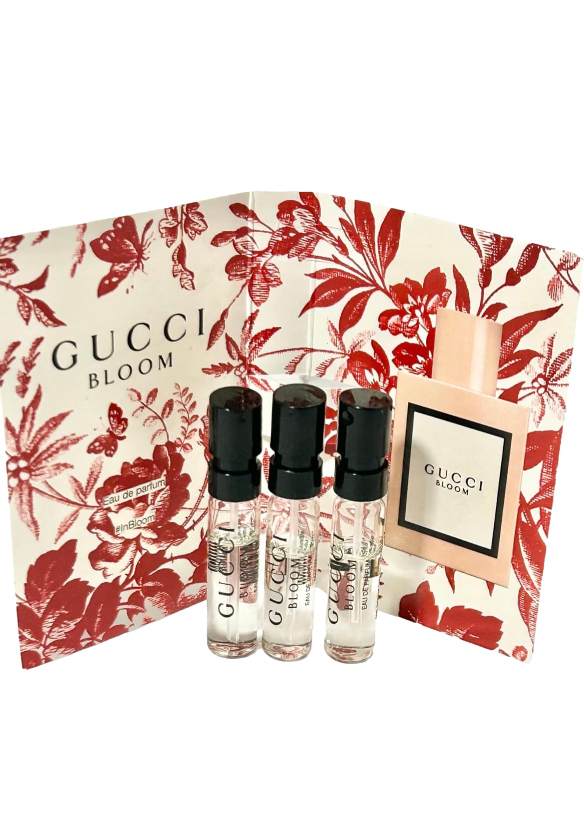 Gucci Bloom travel-size samples showcase three 1.5 ml bottles together.