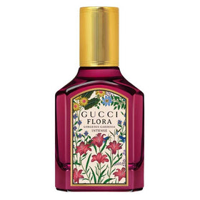 Gucci Flora Gorgeous Gardenia Intense cap close-up highlighting luxury packaging.