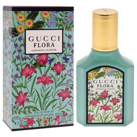 Gucci Flora Gorgeous Jasmine cap detail premium packaging signals luxury.