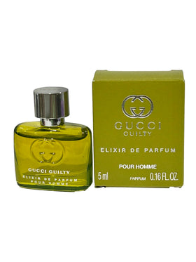 Gucci Guilty Elixir bottle close-up showcases premium amber woody scent for refined presence.