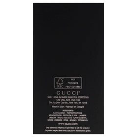 Gucci Guilty Men label detail showcasing brand notes and style.