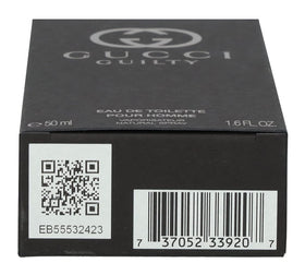 Sleek Gucci Guilty Men bottle on a surface, perfect for vanity display.