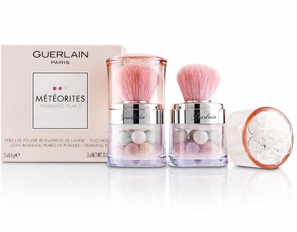 Guerlain Météorites Travelling Pearls light open jar highlighting subtle luminosity for touchups.