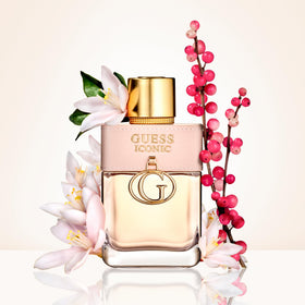 GUESS Iconic bottle cap close-up highlights premium detailing and branding.