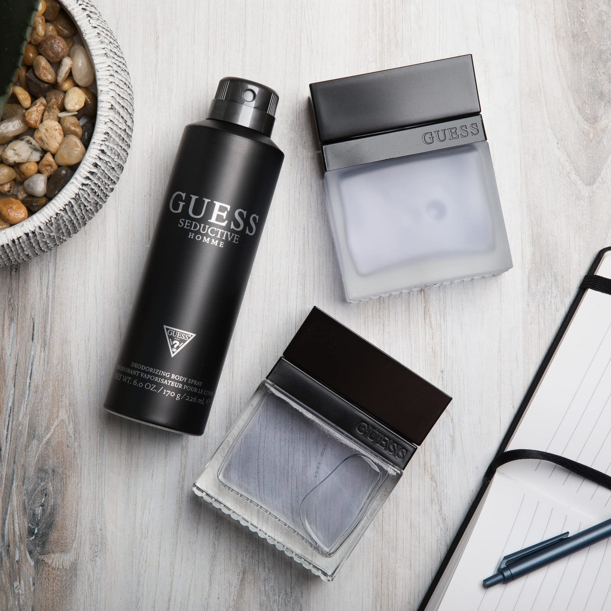 Top notes panel highlights GUESS Seductive Homme cardamom and mandarin pulp.