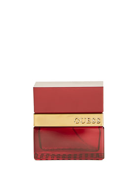 Guess Seductive Red for Men bottle cap close-up highlighting warm vanilla and spice notes
