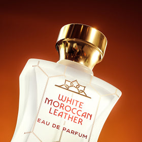 H HABIBI White Moroccan Leather bottle in premium ambience setting.
