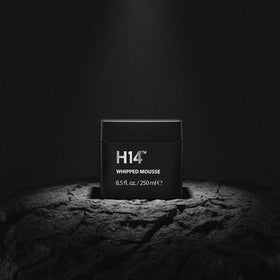 H14 Whipped Mousse in hands demonstrates even distribution for defined waves.