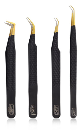 HADIZ four-piece diamond-tip tweezers in black ready for precise lash application.