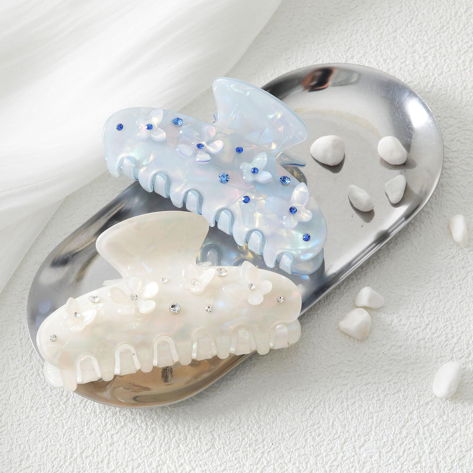 HAIMEIKANG two-piece acrylic flower clips for secure all-day hold.