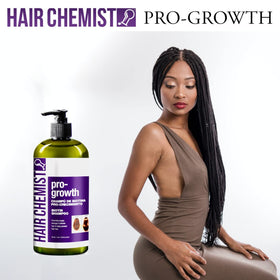 Pouring Hair Chemist Pro-Growth Shampoo to cleanse hair