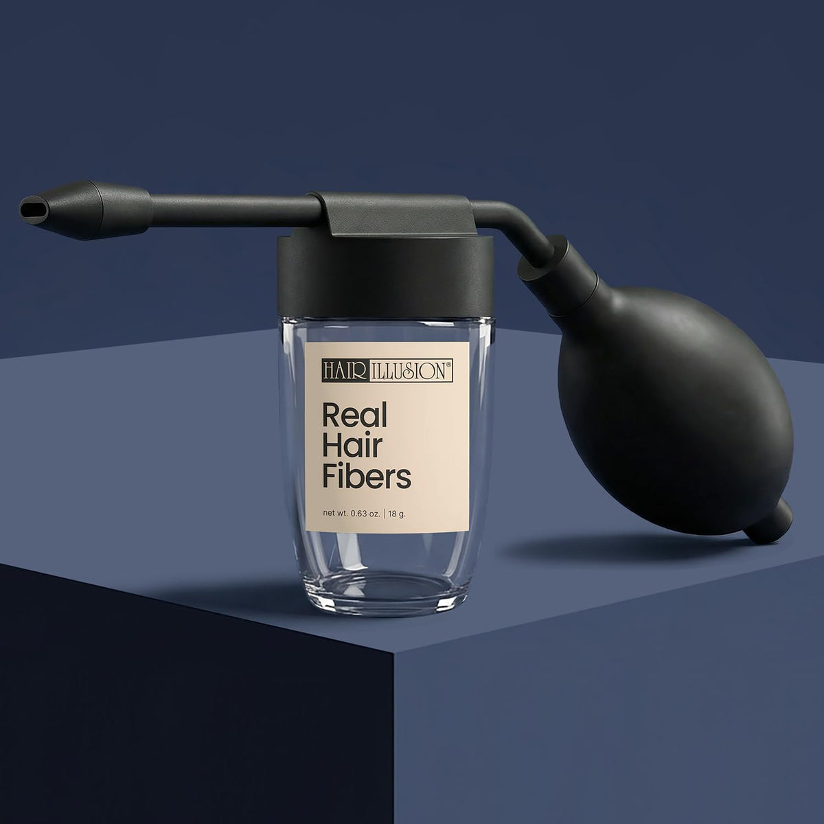 Hair Illusion spray applicator with removable tip storage and portability.