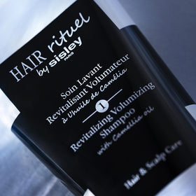 Hair Rituel by Sisley label shows the fortifying complex boosting scalp health.