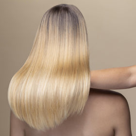 Close-up of Precious Hair Oil texture ready for mid-length use.