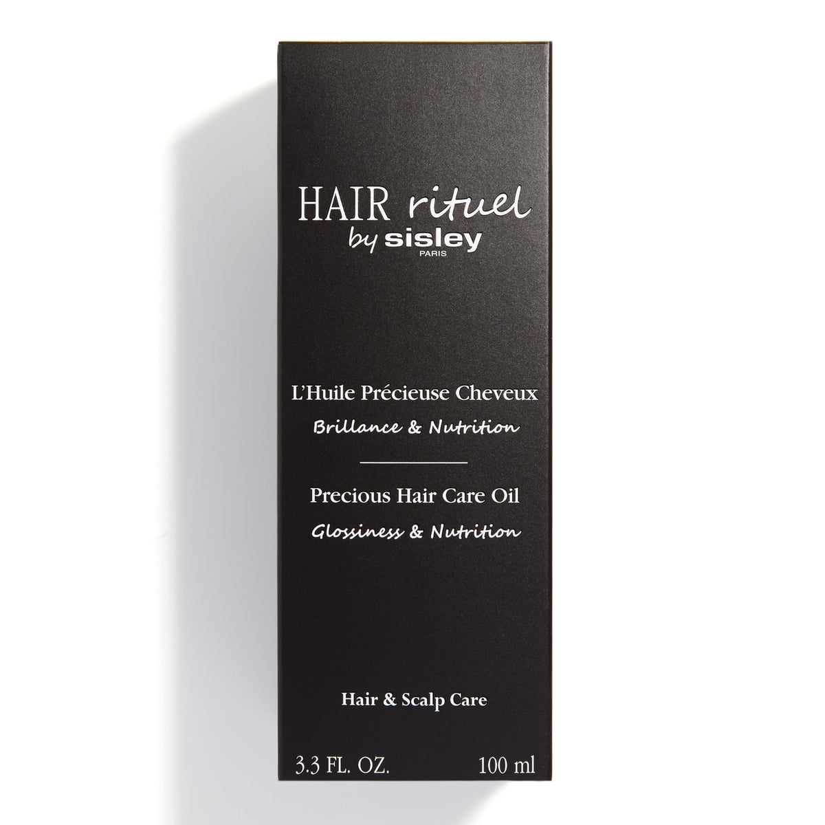 Sleek, glossy hair after using Hair Rituel Precious Hair Oil on styled strands.