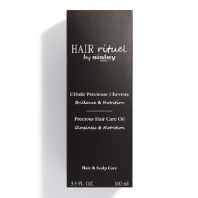 Sleek, glossy hair after using Hair Rituel Precious Hair Oil on styled strands.