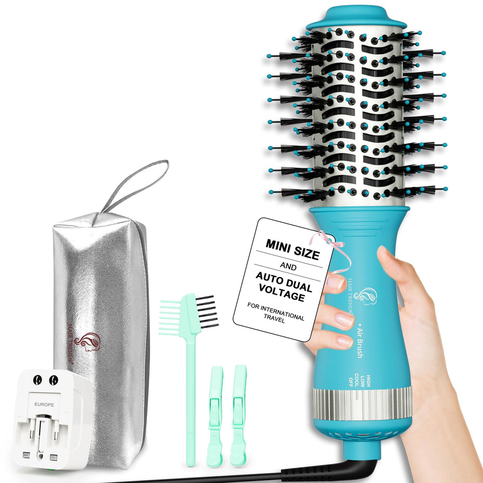 Hair Trends travel size mini hot air dryer brush in hand for quick on the go styling