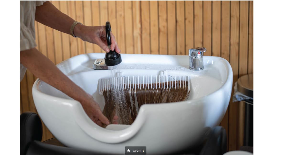 Hair Works ULTRA uses strong suction cups rated up to 3 lbs.