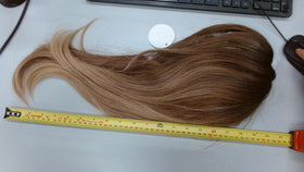 HAIRCUBE Layered Wig color variation under different lighting conditions.