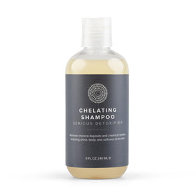 Hairprint Chelating Shampoo bottle label closeup reveals mineral buildup removal.
