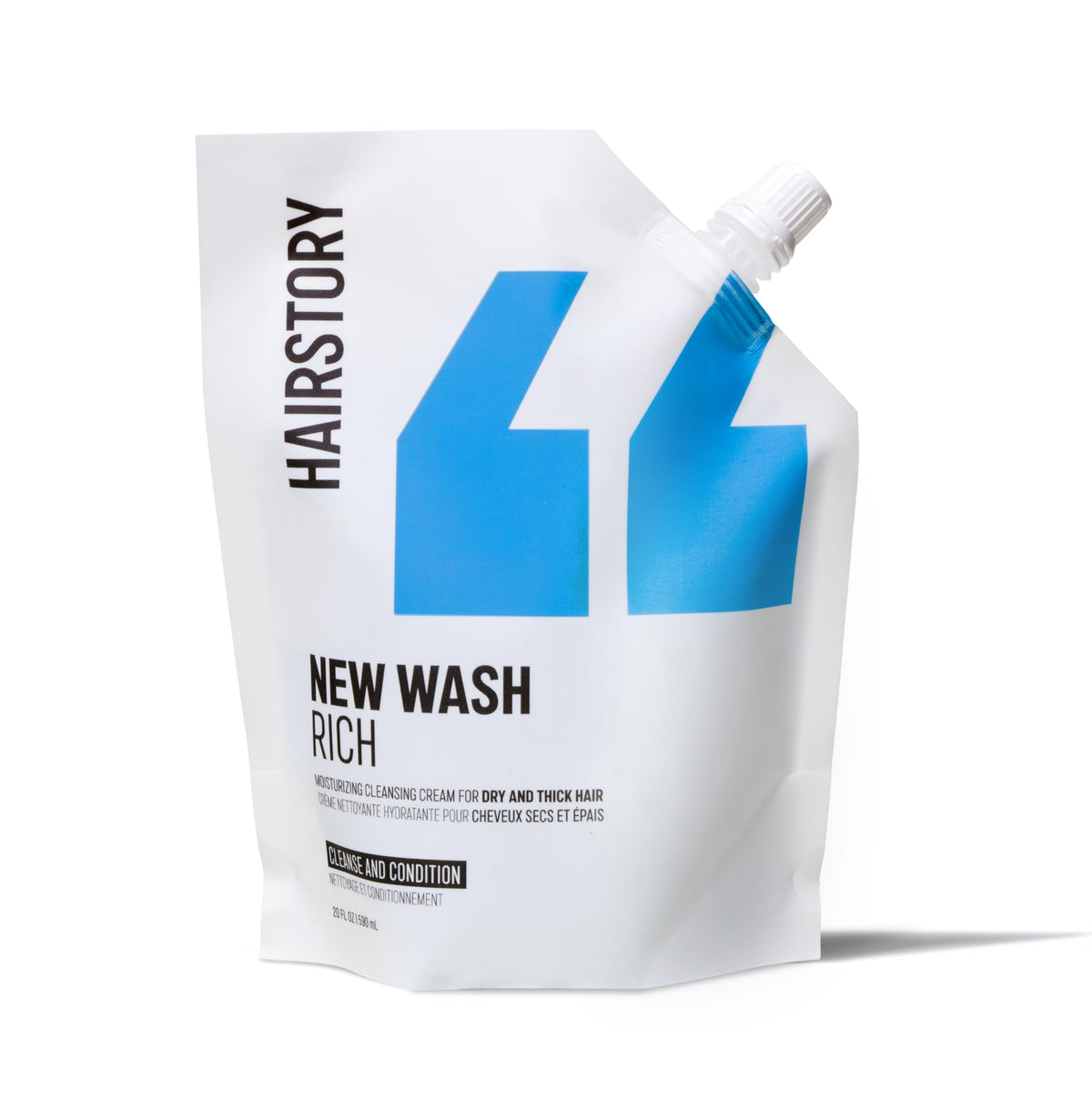 Hairstory New Wash Rich bottle on a bathroom shelf showing deep moisture for thick curls