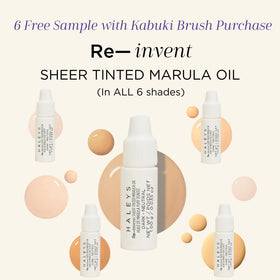 Using HALEYS Kabuki Brush for blending foundation for a soft finish.