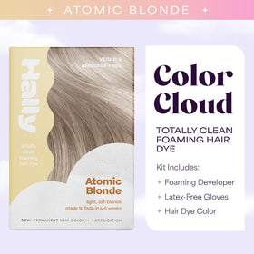 Applying Color Cloud foam to dry hair in sections