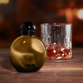 Halston Z-14 spray-ready bottle on wrist, all-occasion fragrance option.