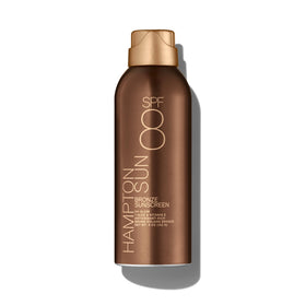 Hampton Sun SPF 8 Bronze mist in use, delivering an even bronze glow