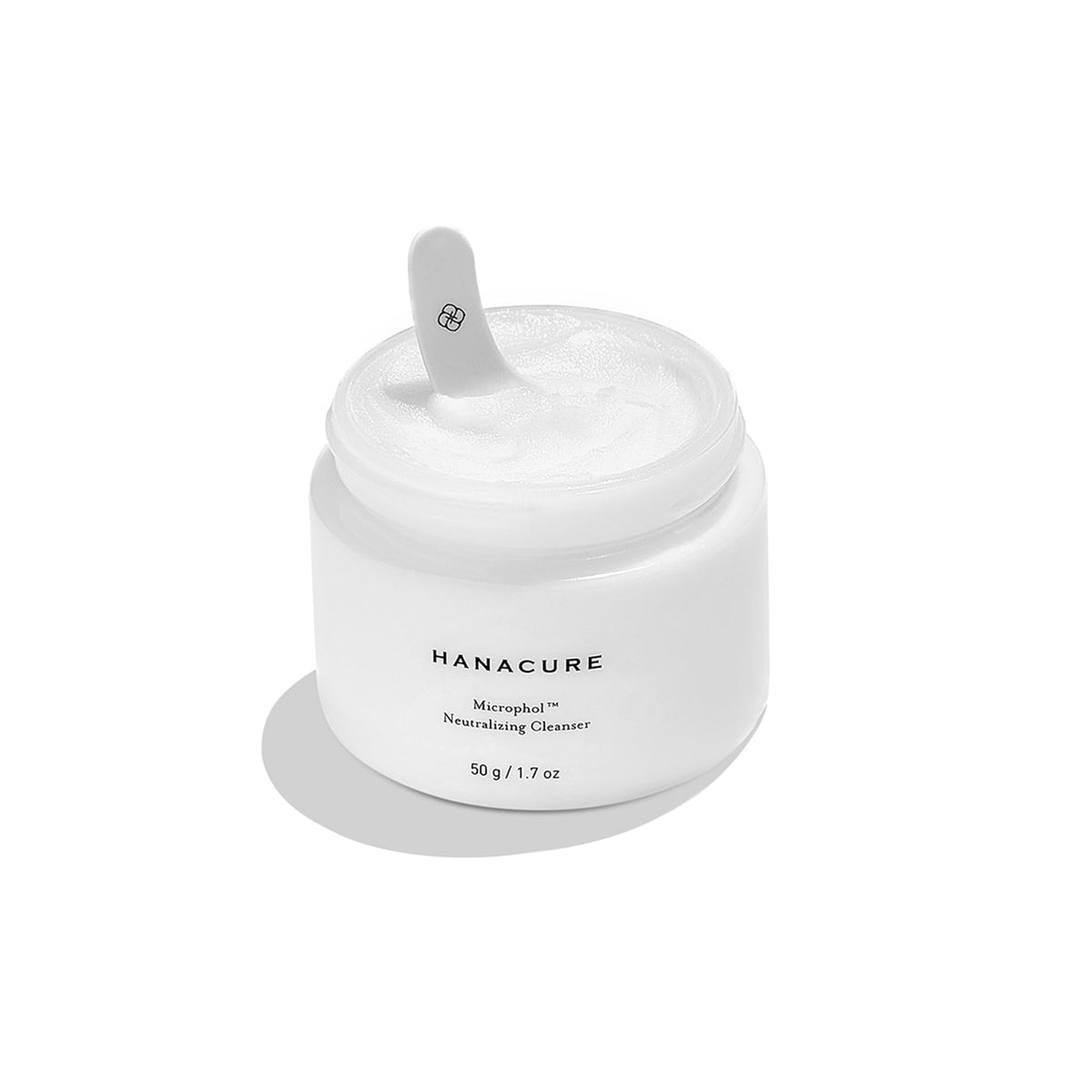 Hanacure Microphol cleanser bottle pouring for a gentle pH-balanced cleanse