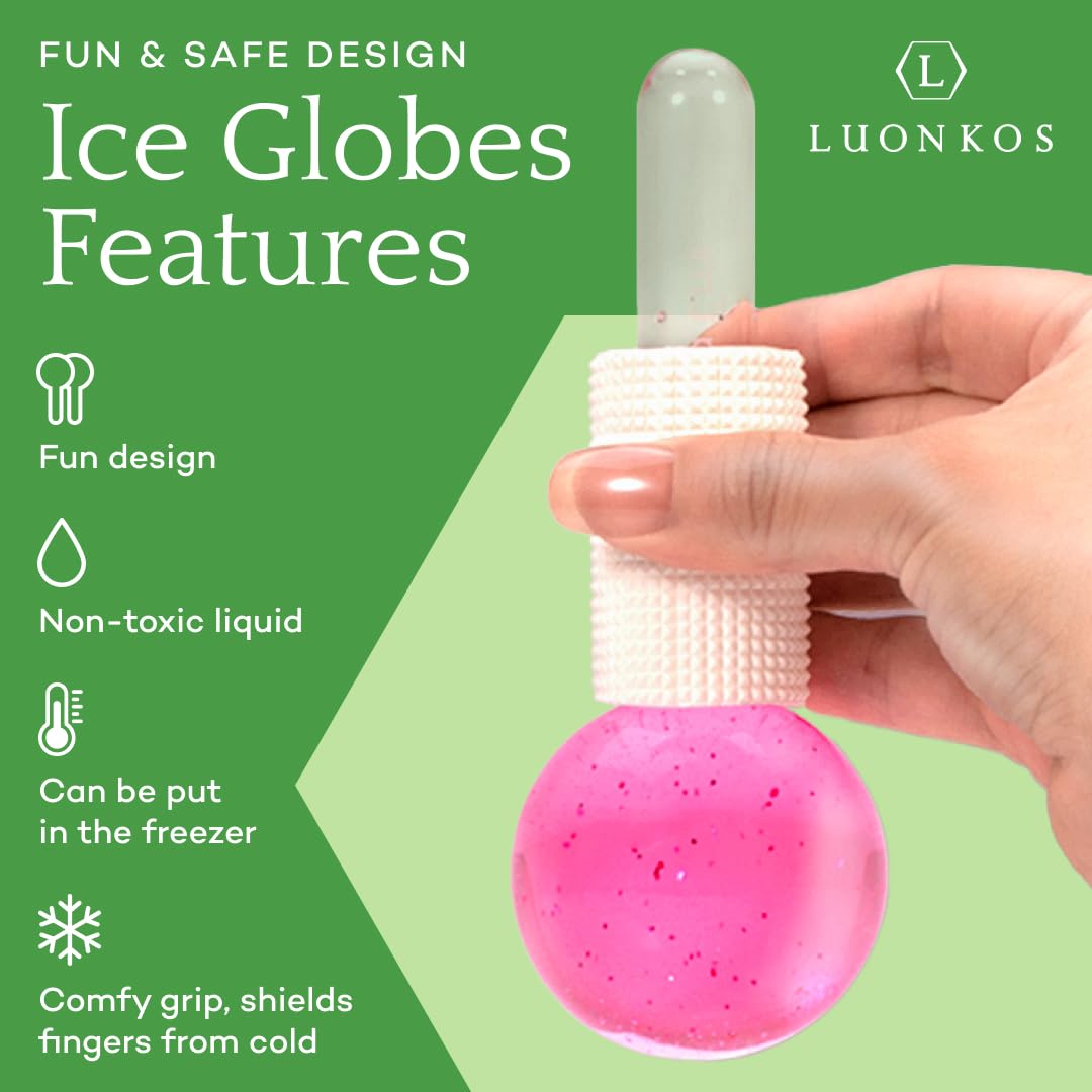 Elegant pink glass face massagers with ergonomic handles for easy use.