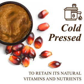 Handcraft Blends Batana oil on hair strands for deep conditioning.