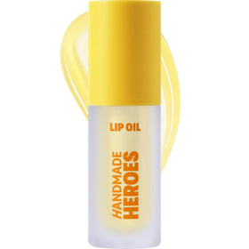 Handmade Heroes turmeric vitamin C lip gloss tube with radiant natural shine.