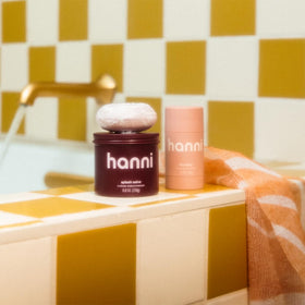 HANNI shower scarf hangs neatly to dry, keeping your routine tidy