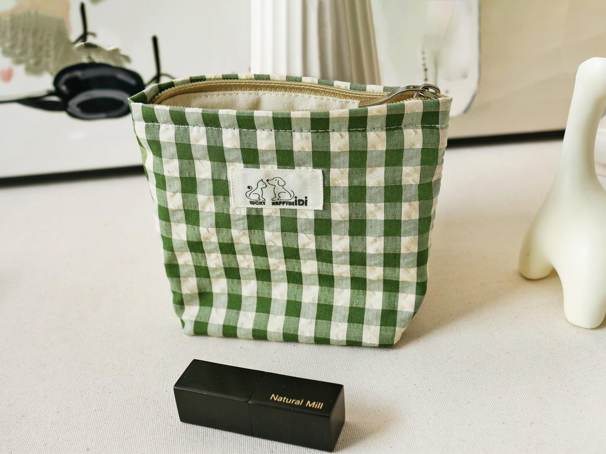 HAPPYHEIDI flat-bottom design keeps pouches standing on a vanity