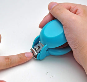 HARAC no mess nail catcher keeps nails contained during clipping.
