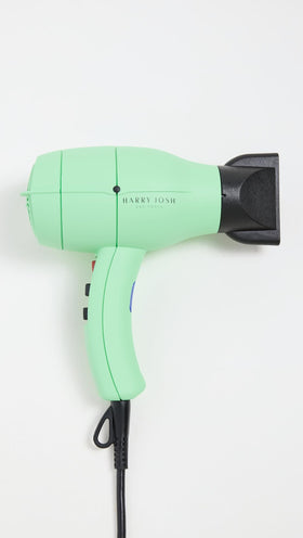 Harry Josh Pro Tools Pro Dryer 2000 standard nozzle supports smooth styling.