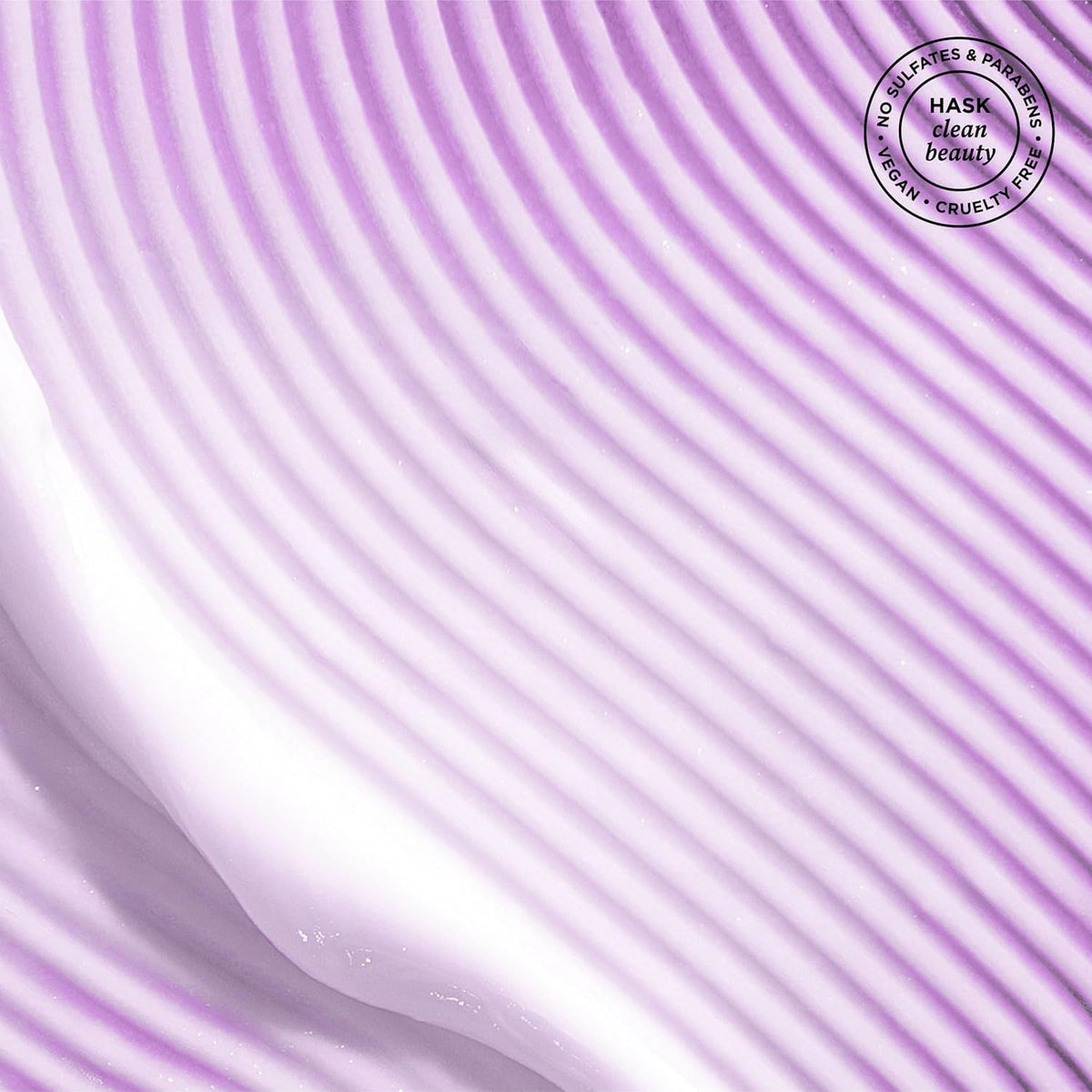 HASK Argan Oil droplets image highlights omega fatty acids and vitamin E.