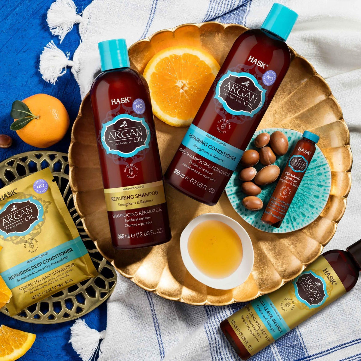 HASK Argan Oil Repairing Conditioner on bathroom shelf ready for daily use