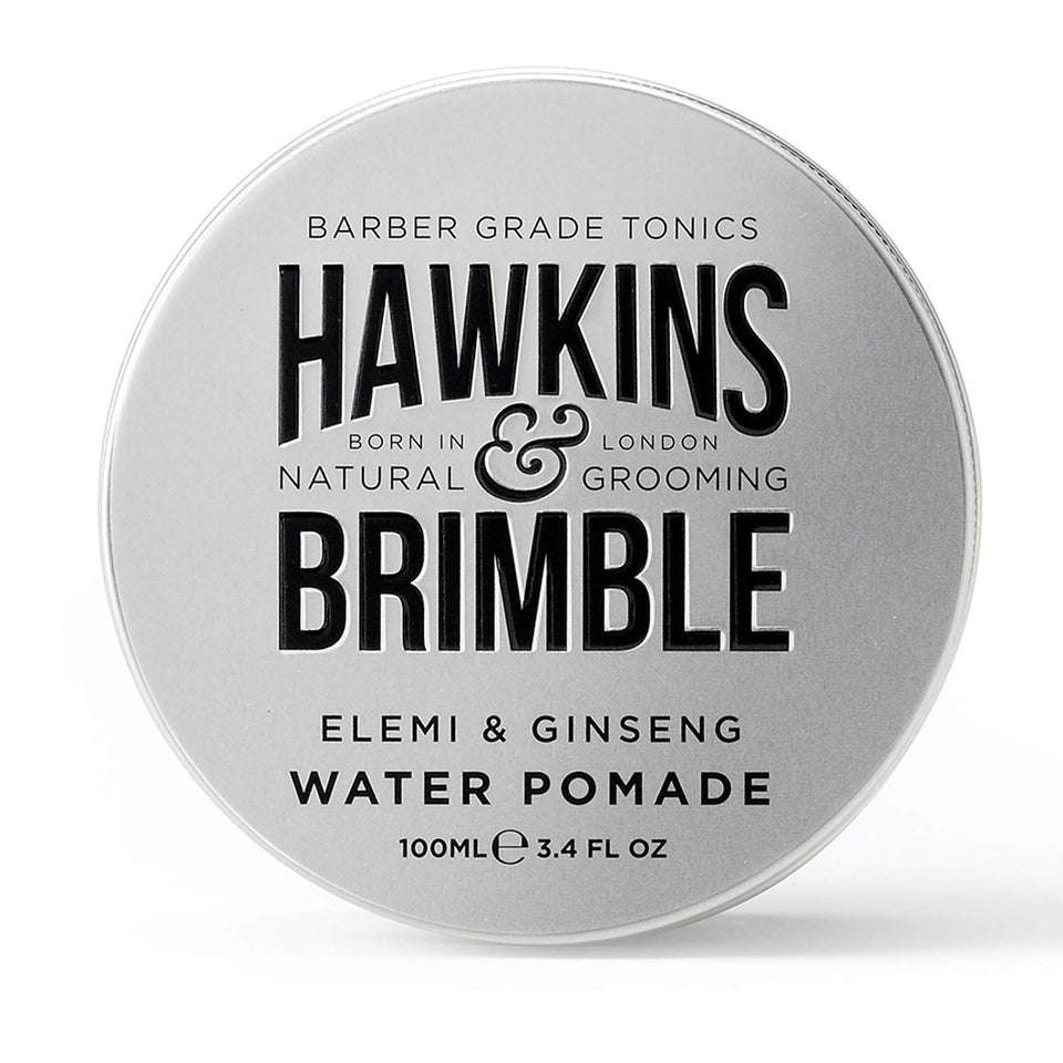 Hawkins & Brimble strong hold pomade bottle pour for confident styling.