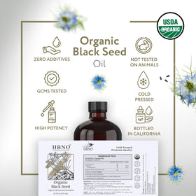 HBNO Black Seed Oil glass close-up reveals rich amber color and premium bottle.
