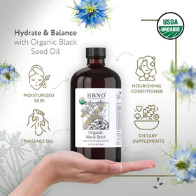 HBNO Black Seed Oil pour demonstrates easy topical usage for daily care.