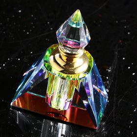 H&D HYALINE & DORA refillable mini bottle with clear glass, elegant design.