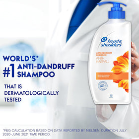 Head & Shoulders bottle pouring product into hand, ready for scalp care